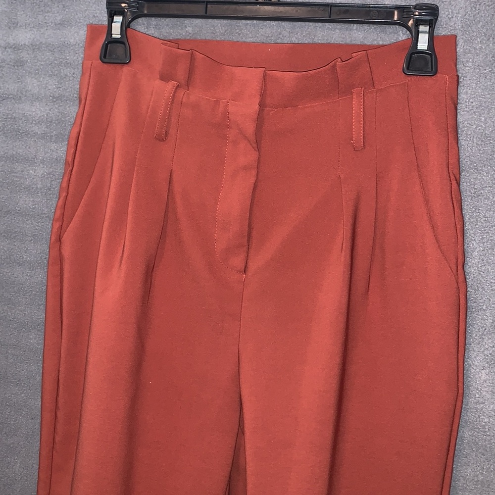 Burnt orange colored business casual pants
